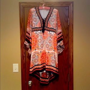 Women’s boho, flown sleeve, high low hem dress